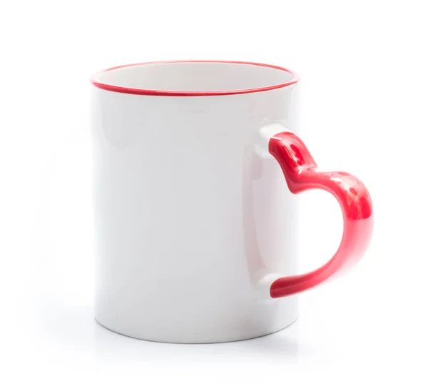 White cup with red handle in heart shape — Stock Photo, Image