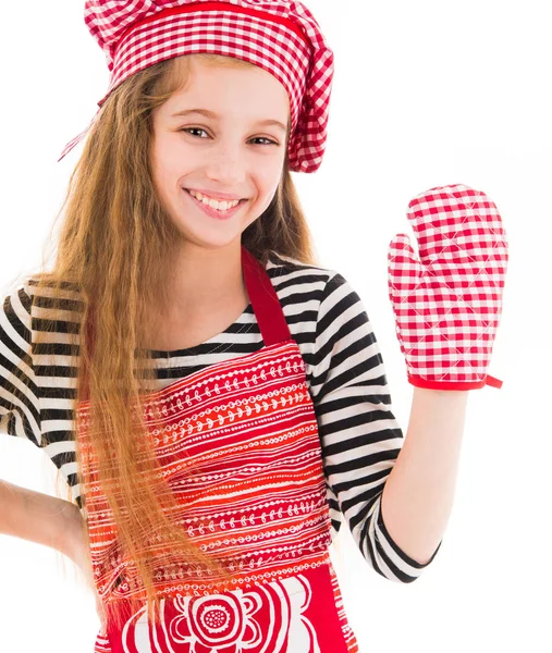 Meisje in de rode schort en bakken handschoen — Stockfoto