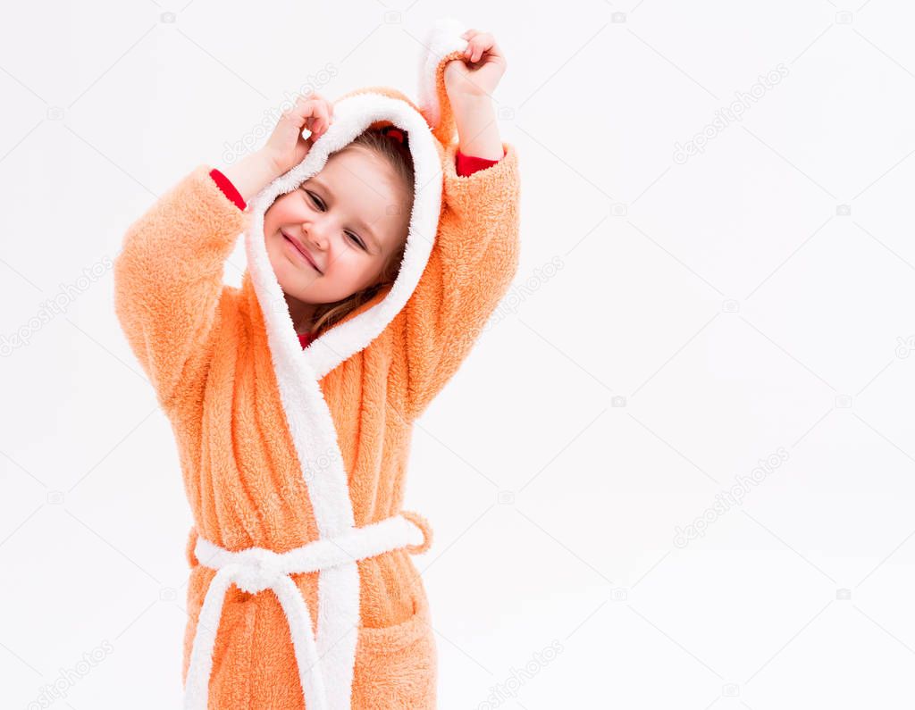 kid playing in bathrobe with bunny ears
