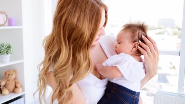 Mother hugging her baby — Stock Video