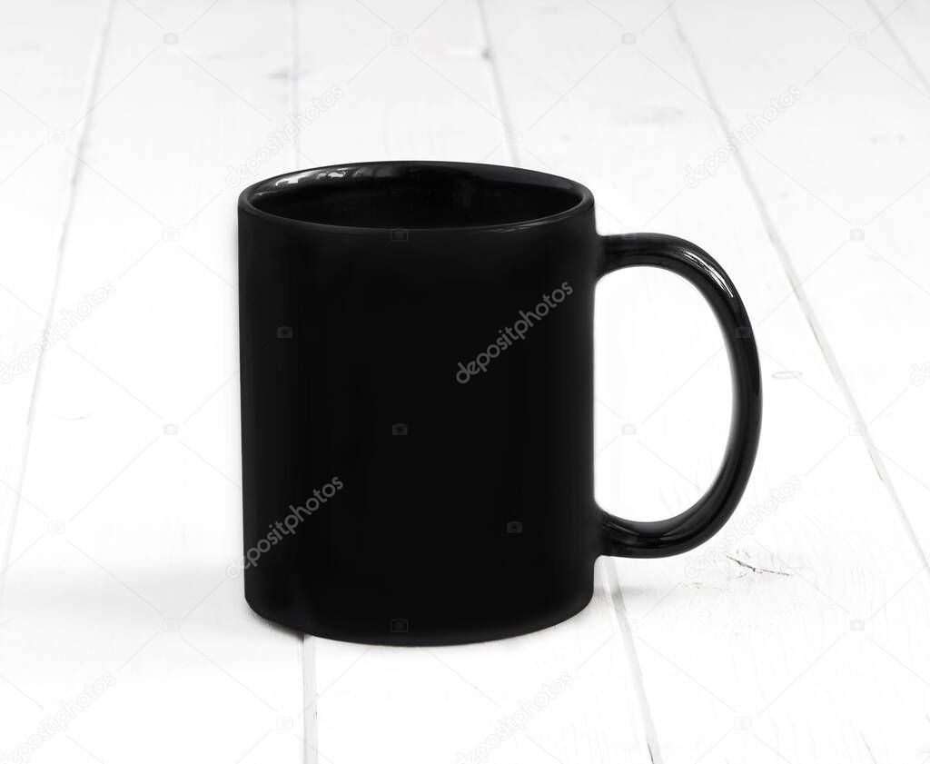 black cup on a white table