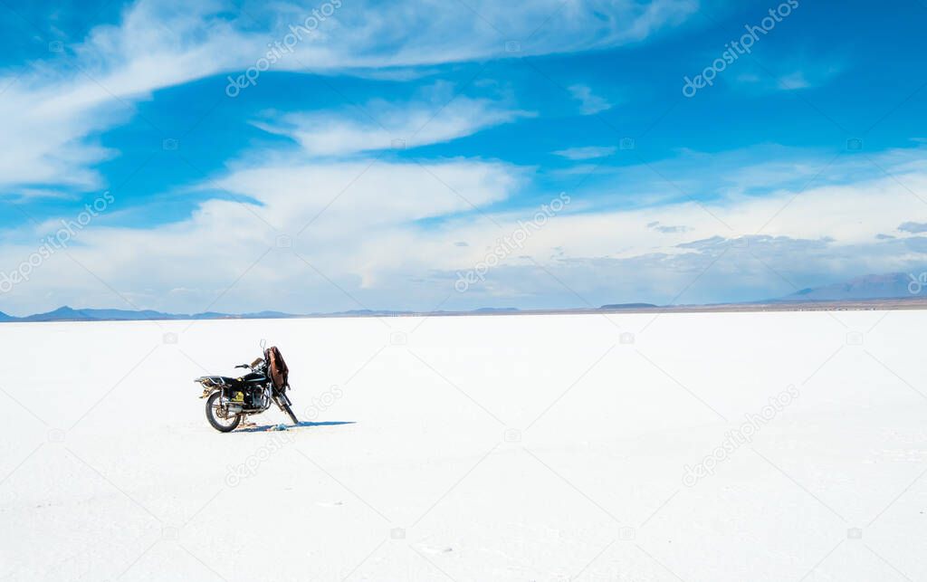 Motorbike on the background of Salar de Uyuni