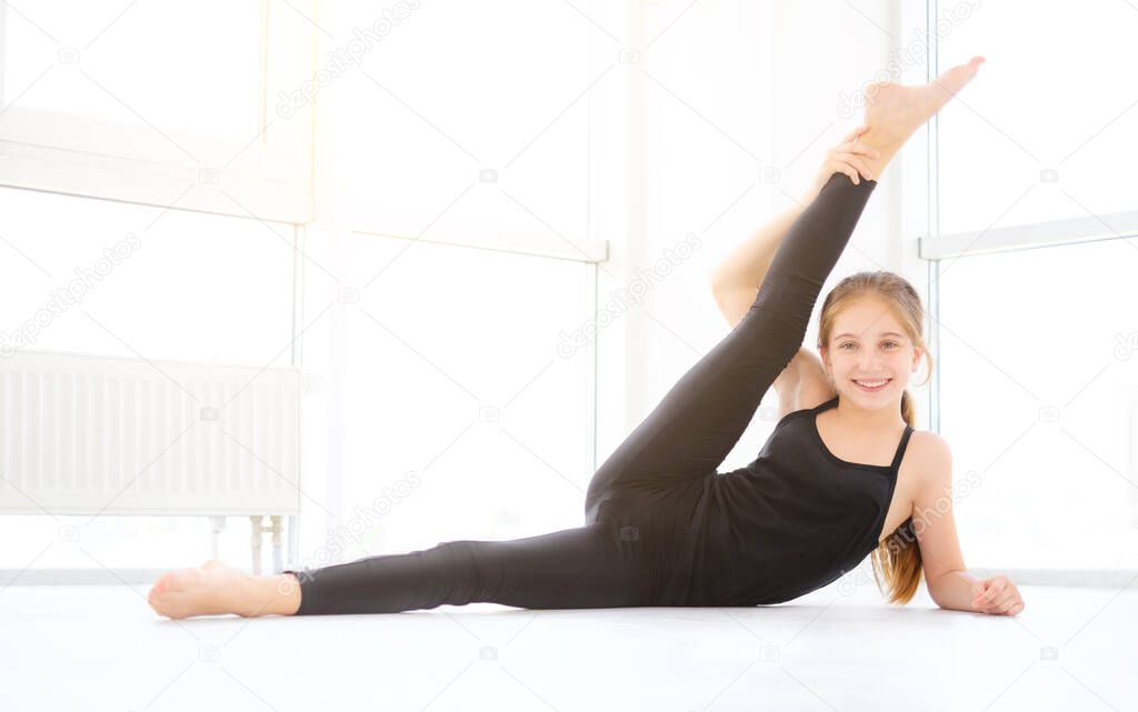 girl dancer doing stretching