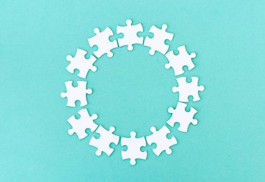 Circle made of puzzle pieces clipart