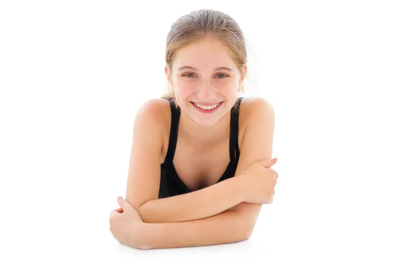 Cute teenager girl lying on a floor — Stock Photo, Image