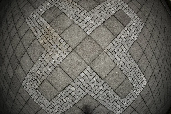 Símbolo X abstrato na telha de concreto — Fotografia de Stock