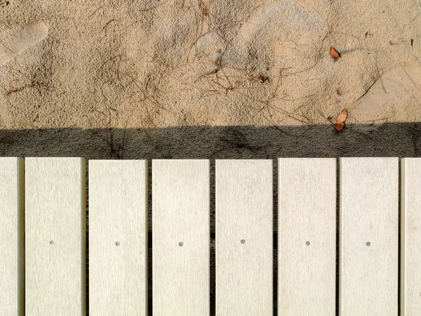 Pozadí dřevěný chodník bílá — Stock fotografie