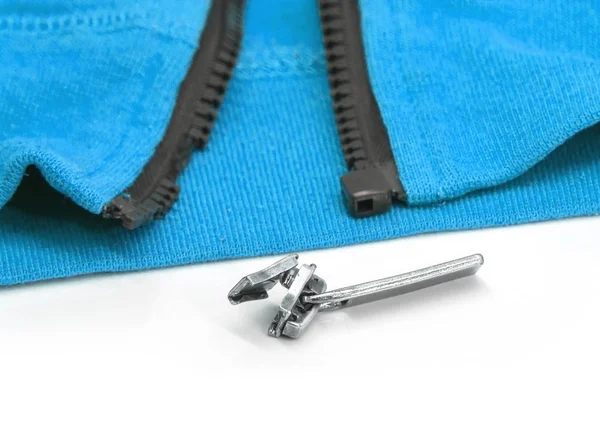 Blue hoody with broken zipper. Detail close-up photo ロイヤリティフリーのストック写真