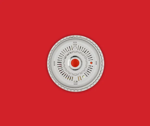 Kouřový Alarm izolované na červené — Stock fotografie
