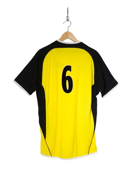 Yellow football shirt on hanger — Stock Photo, Image