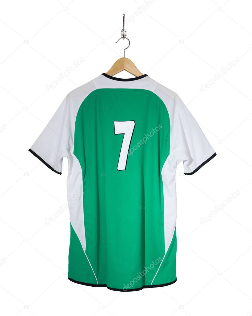 Green football shirt on hanger