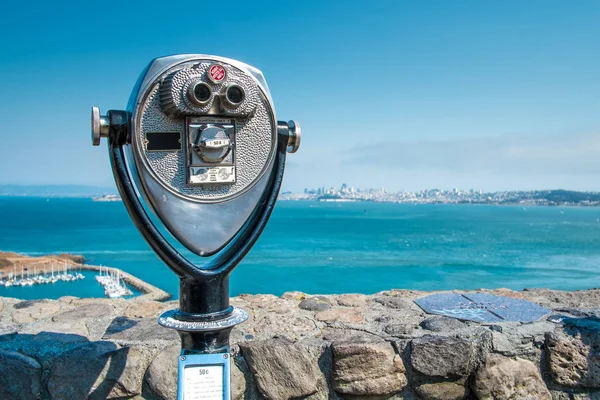 Binocular viewer against seascape Stok Gambar