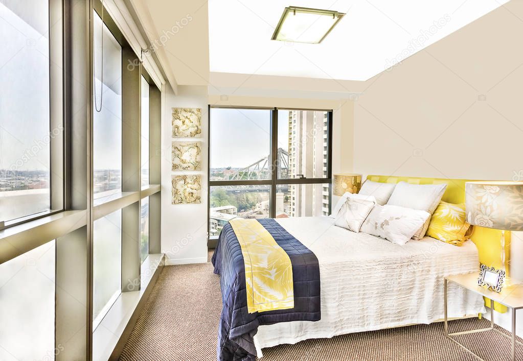Shiny bedroom with  designs and facilities near bridge.