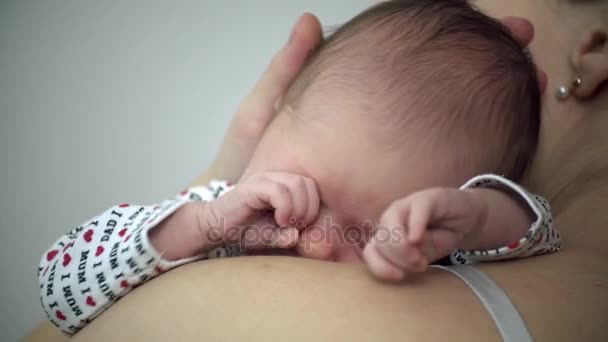 Newborn Baby Yawns Closeup Shoulder — Stock Video