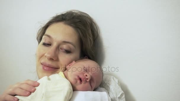 Mother Stroking Newborn Baby Sleeping Closeup Shoulder — Stock Video