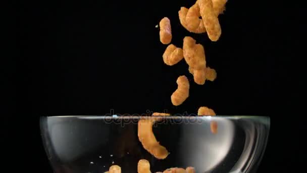 Corn Sticks Falling into a Glass Bowl — Stock Footage Corn Sticks Falling into a Glass Bowl Royalty Free Stock Video