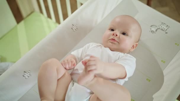 Baby Lying in Bed at Home — Stock Video