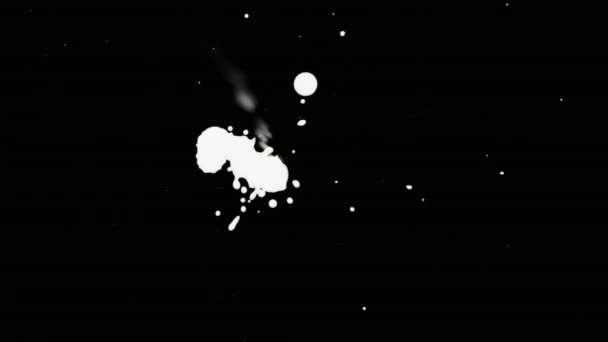 Брызги чернил на фоне черного экрана — стоковое видео