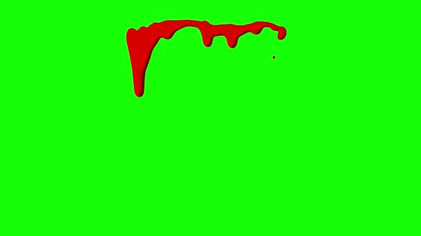 Tinta roja goteando sobre fondo de pantalla verde — Vídeo de stock