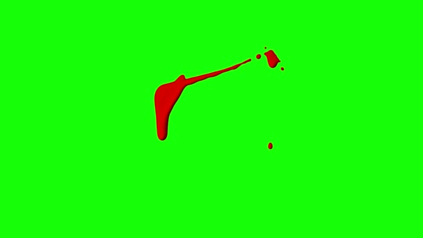 Красные чернила капают на зеленом фоне экрана — стоковое видео