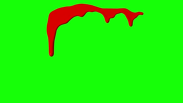 Tinta vermelha pingando sobre fundo de tela verde — Vídeo de Stock