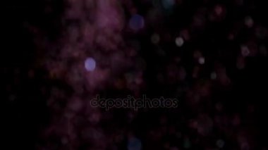 Siyah arka plan üzerinde patlayan gerçekçi Glitter.