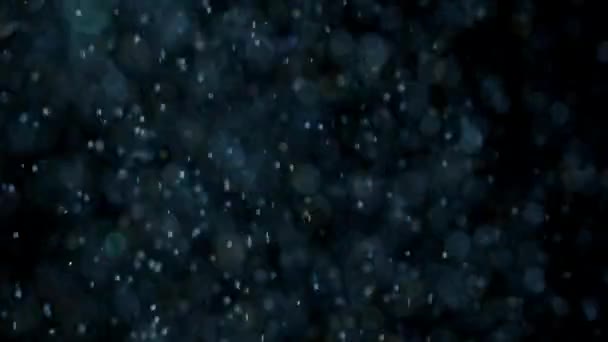 Esplosione di glitter realistici su sfondo nero . — Video Stock