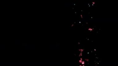 Siyah arka plan üzerinde patlayan gerçekçi Glitter.