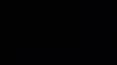 Siyah arka plan üzerinde patlayan gerçekçi Glitter.