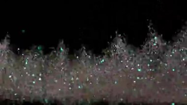 Siyah arka plan üzerinde patlayan gerçekçi Glitter.