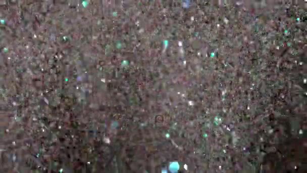 Esplosione di glitter realistici su sfondo nero . — Video Stock