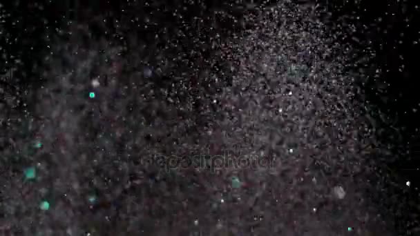 Realista Glitter Explodindo em fundo preto . — Vídeo de Stock