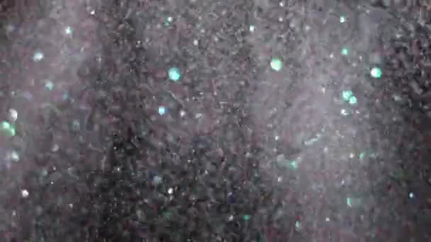 Realistic Glitter Exploding on Black Background. — Stock Video