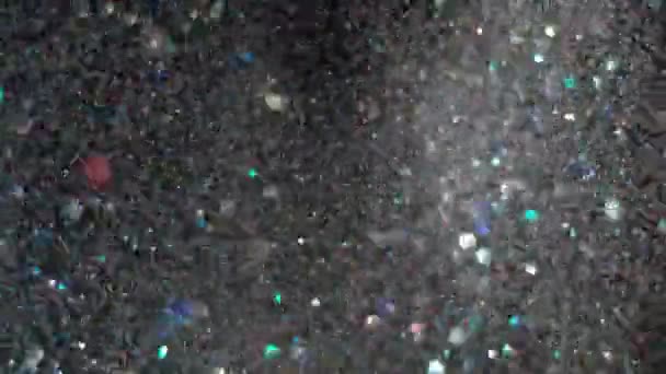 Realista Glitter Explodindo em fundo preto . — Vídeo de Stock