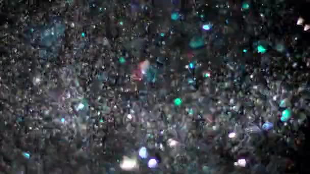 Glitter realista que explota en el fondo negro . — Vídeo de stock