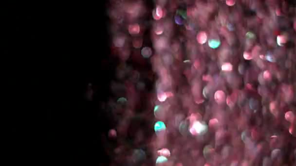 Realistische Glitter exploderen op zwarte achtergrond. — Stockvideo