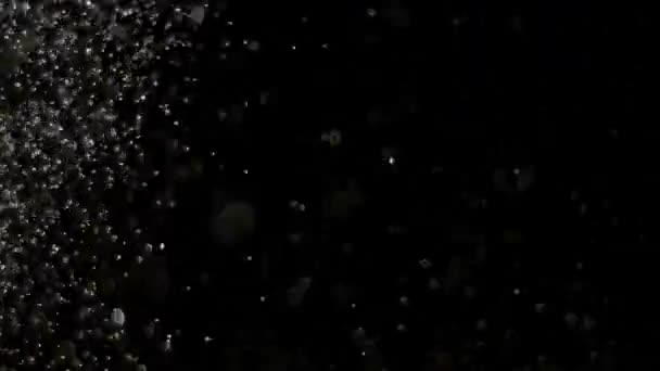 Realistischer Glanz explodiert auf schwarzem Hintergrund. — Stockvideo