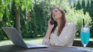 Business Lady Talking on the Phone