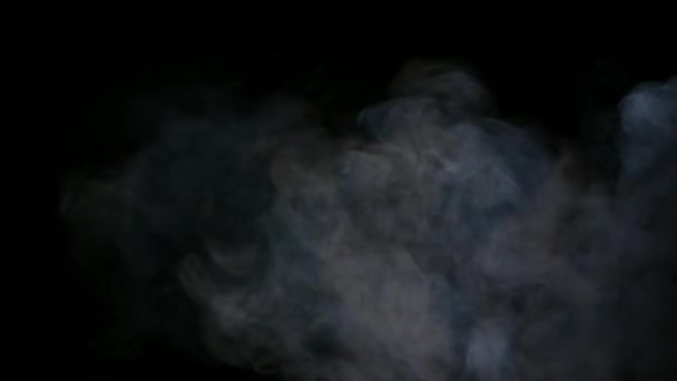 Fumée blanche isolée sur fond noir — Video