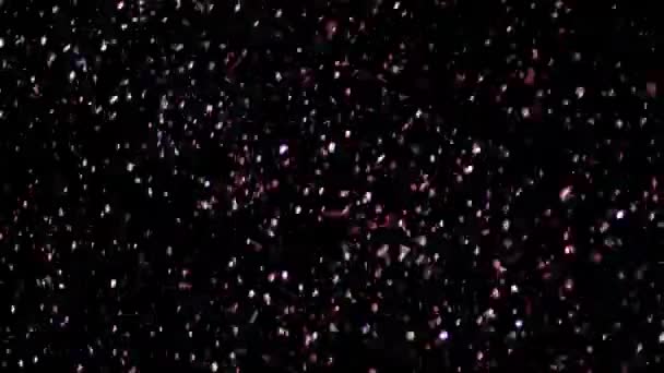 Realistické Glitter vybuchující na černém pozadí. — Stock video
