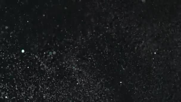 現実的なキラキラ黒の背景上で爆発. — ストック動画