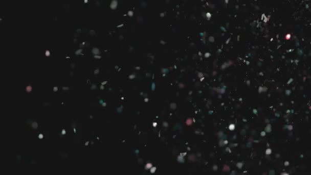 Realista Glitter Explodindo em fundo preto . — Vídeo de Stock