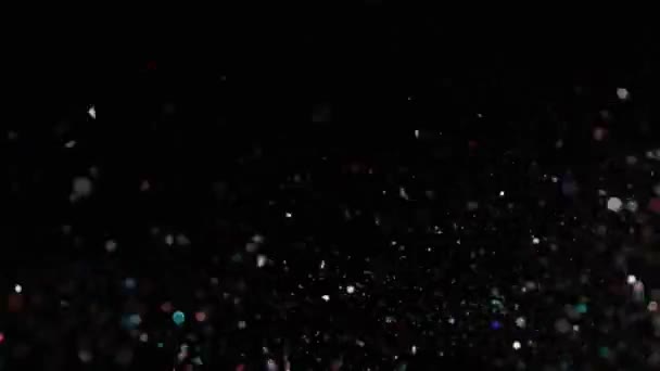 Realista Glitter Explodindo em fundo preto . — Vídeo de Stock