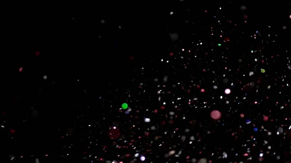 Glitter realista que explota en el fondo negro . — Foto de Stock