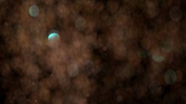 Siyah arka plan üzerinde patlayan gerçekçi Glitter.