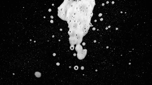 White Foam Over Black Screen Background