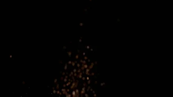 Realistic Glitter Exploding on Black Background. — Stock Photo, Image