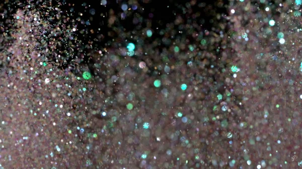 Realistische Glitter exploderen op zwarte achtergrond. — Stockfoto