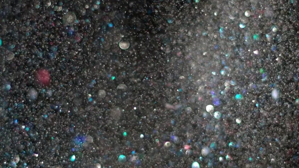 Realista Glitter Explodindo em fundo preto . — Fotografia de Stock