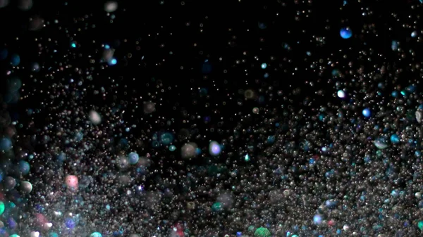 Realistic Glitter Exploding on Black Background. — Stock Photo, Image